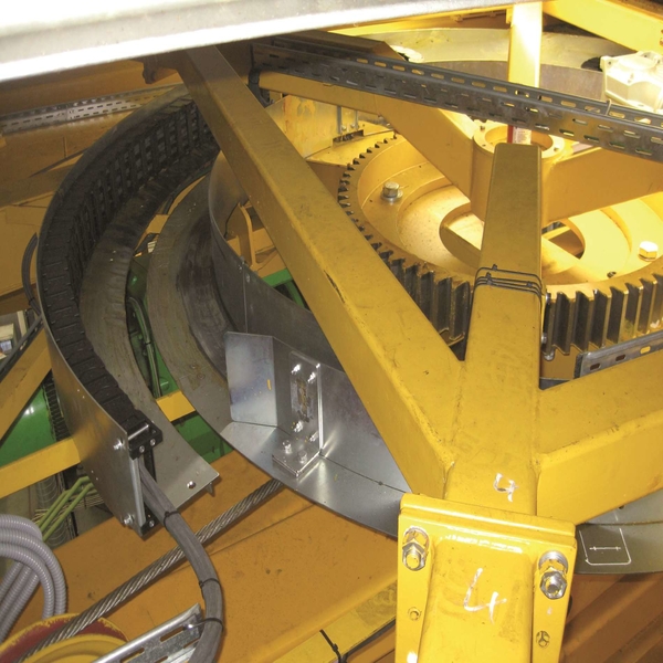 Compact energy chain systems for indoor cranes